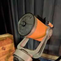 The models on display here are in the back the classic orange tube C8 built in the 70s, in the middle the black C8 that first appeared in 1984, and in the front, the most recent Nexstar 8 series announced in 2000. Celestron 8 inch SCT from the 1970s